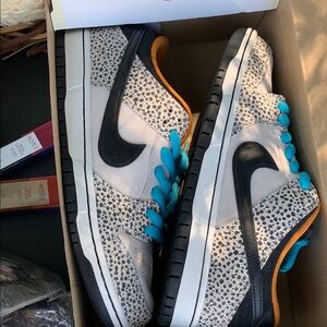Nike Speckled Sneakers with Turquoise and Orange Accents new never worn.
